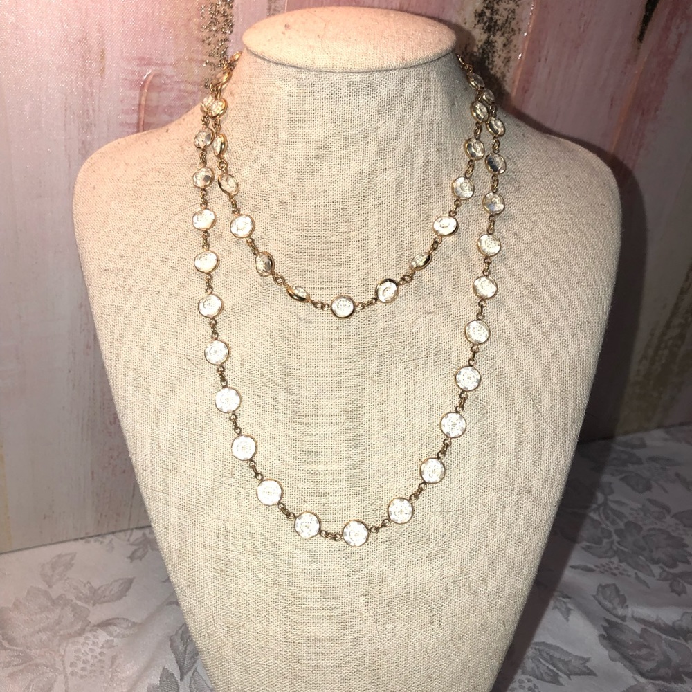 Gold tone wrap necklace with clear CZs